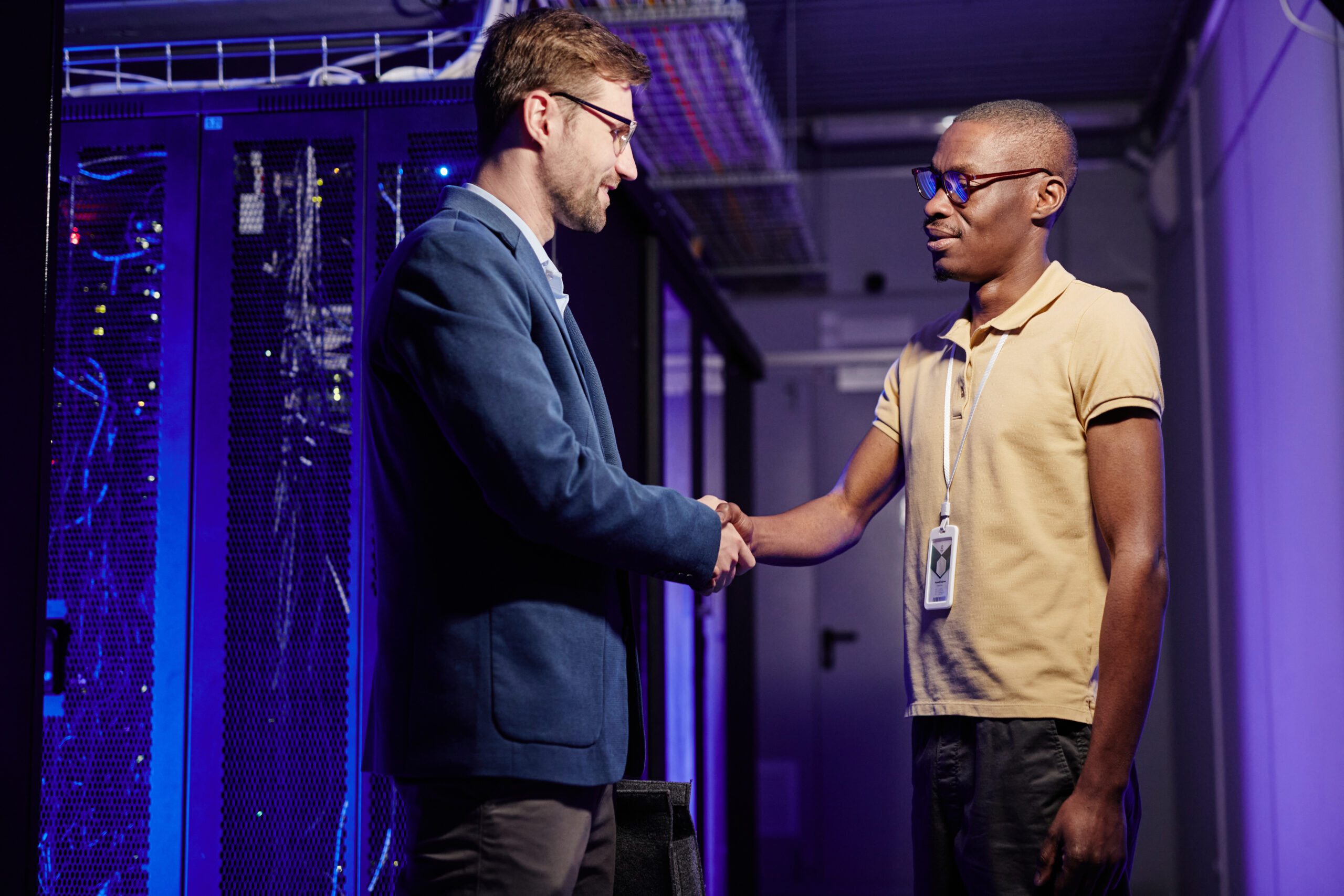 Person working with IoT devices and cloud interfaces